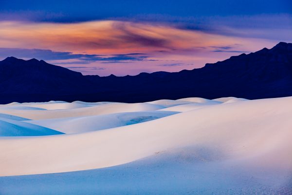 Wilderness landscape photography of sunrise over dunes in White Sands National Park in New Mexico