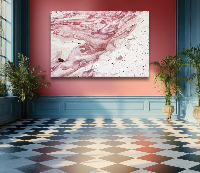 Abstract patterns of pink and white sand swirls sculpted by the wind on a beach in the Falkland Islands, showcasing nature’s artistic beauty.